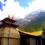 The ancient Badrinath shrine amidst the snow capped peaks of the Himalaya mountains, Uttarakhand, India